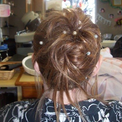 Chignon banane bouclé