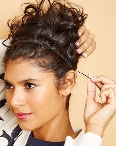 Chignon haut bouclé