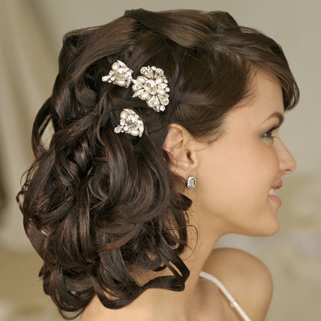 Coiffure de mariage cheveux bouclés