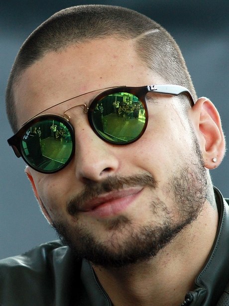 Coiffure homme court coté long dessus